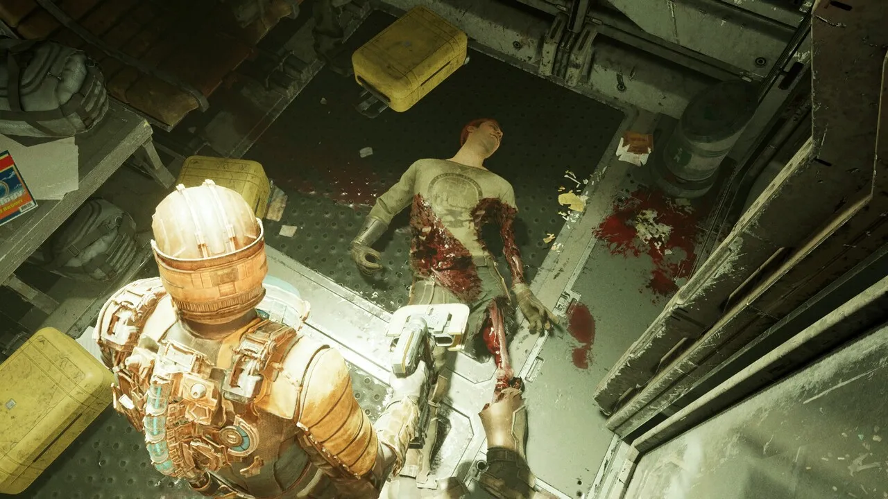 A close-up shot of Isaac firing the Plasma Cutter at a Necromorph's leg. The limb shows signs of damage, with exposed flesh and bone.