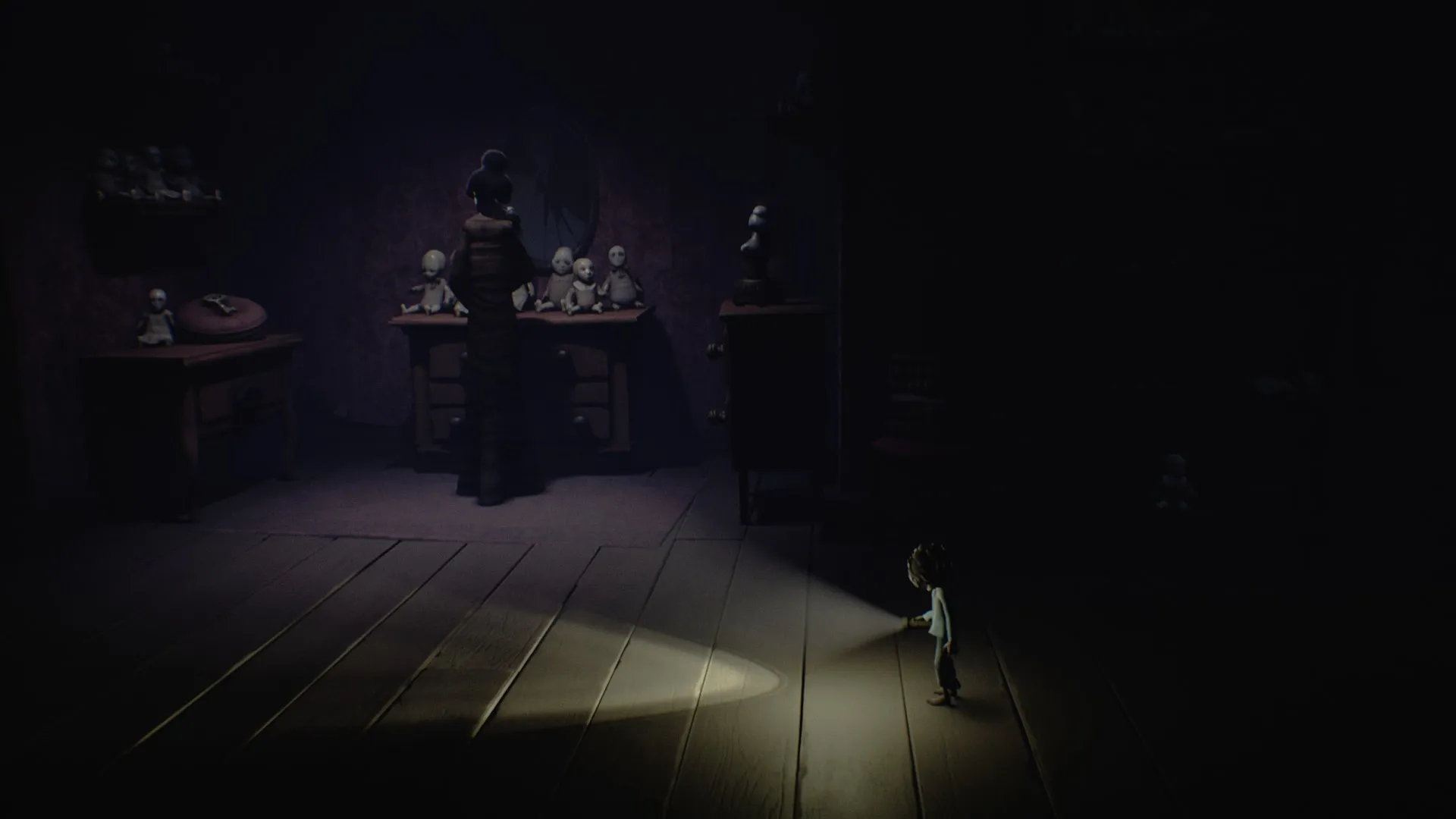 alt: A promotional image for Little Nightmares Complete Edition