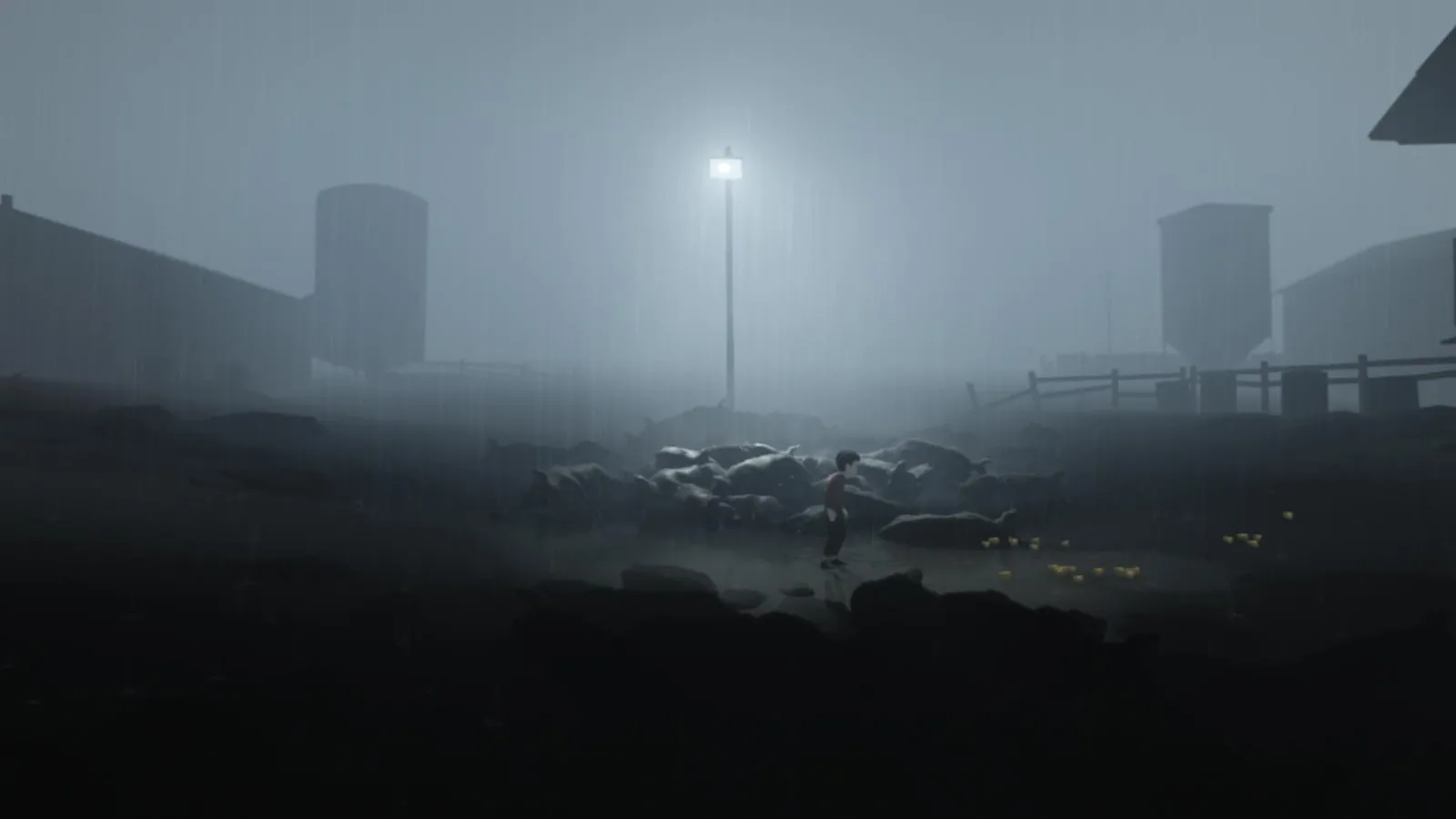 alt: A screenshot from Inside showing the boy running through a dark forest.