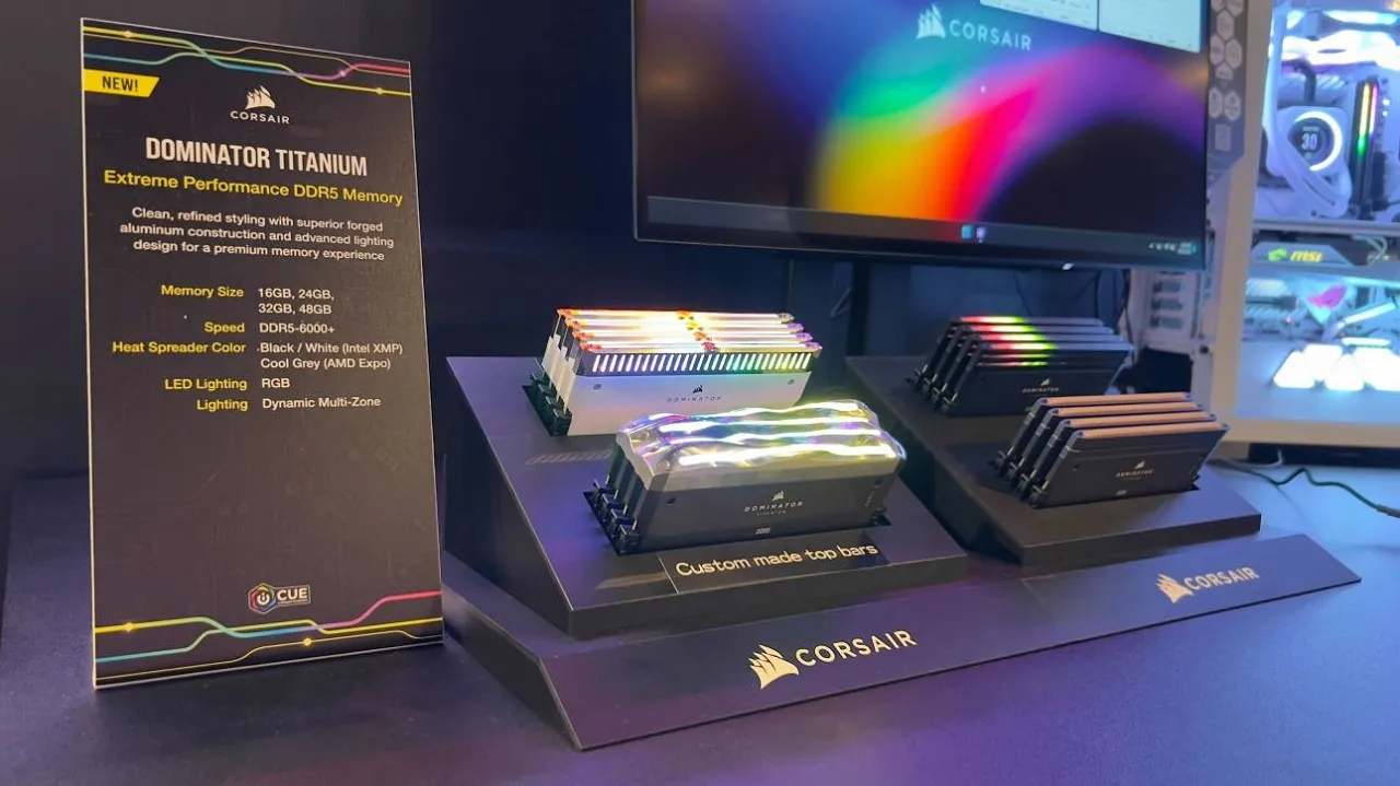 alt: Close-up of Corsair Dominator Titanium DDR5 RAM modules showcasing their sleek design and integrated RGB lighting.