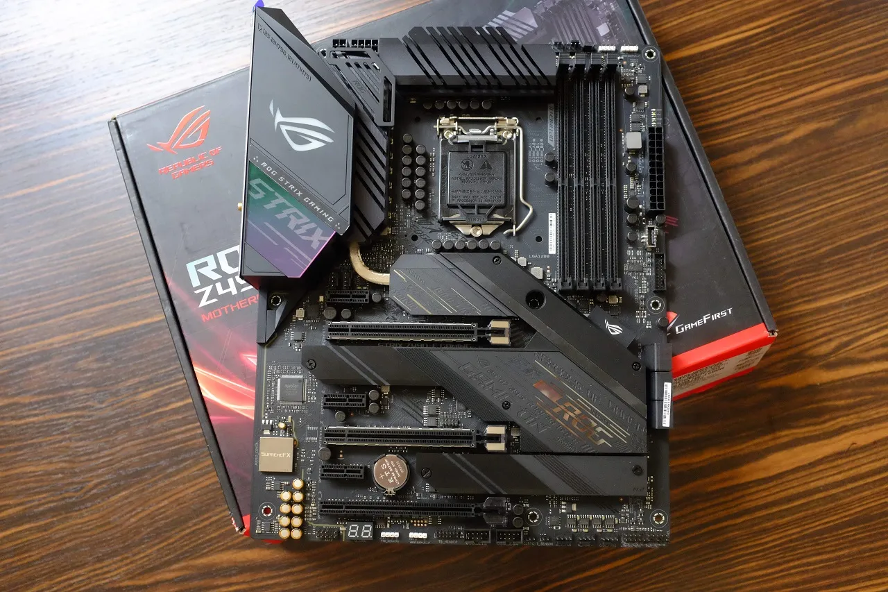 alt text: ASUS ROG Strix Z490-E Gaming motherboard overview, showcasing its sleek design and RGB lighting.