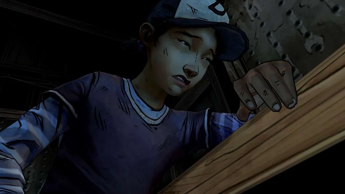 alt text: Clementine in The Walking Dead Season Two, holding a knife and looking determined.