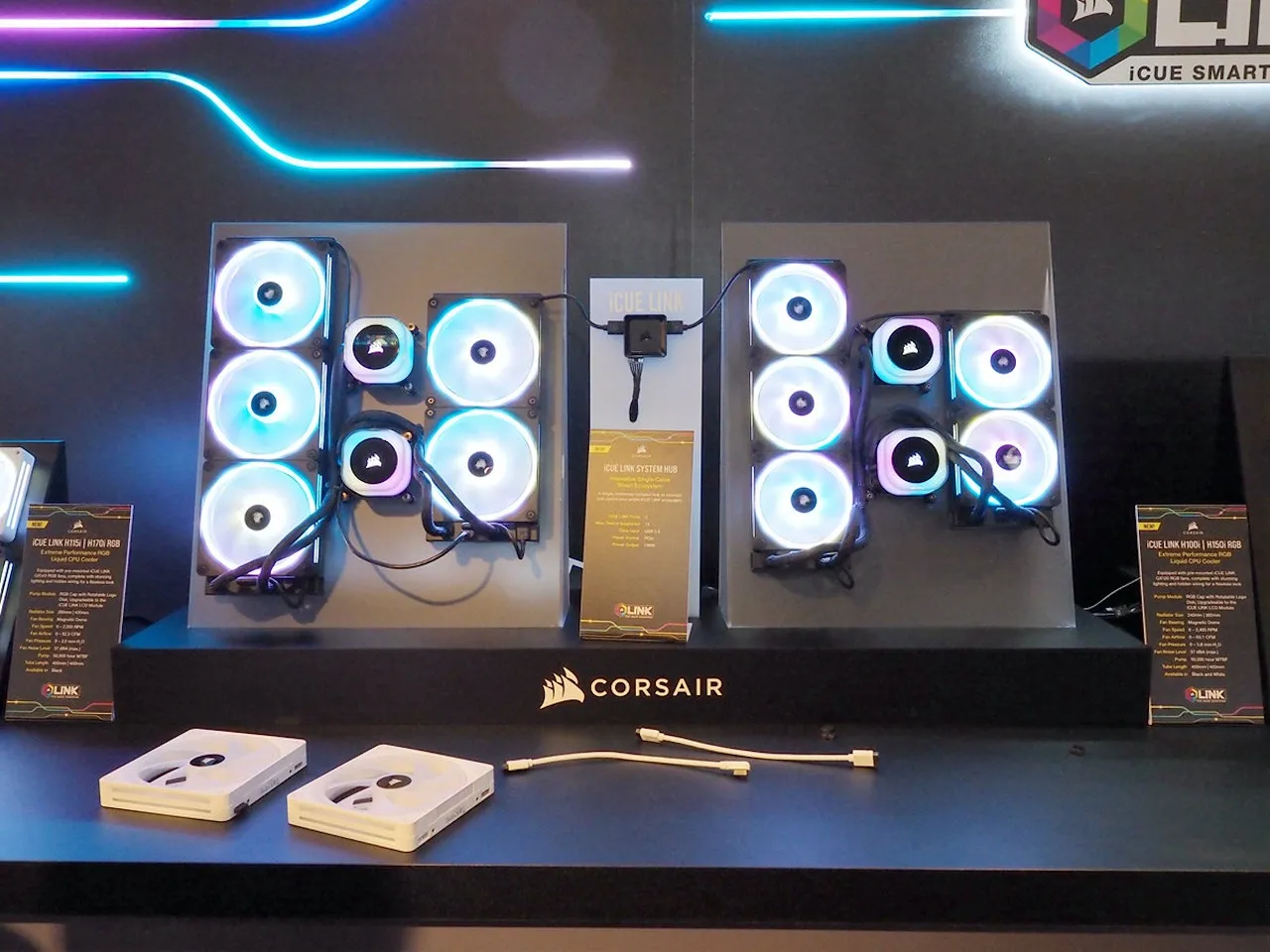 alt text: CORSAIR iCUE LINK System Hub and connected components, demonstrating the simplified cabling and clean aesthetic.