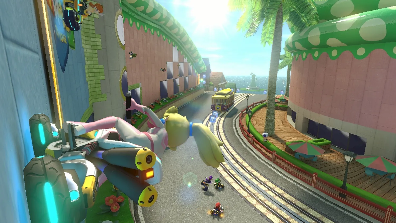 alt text describing image of Mario Kart 8 gameplay showing a kart drifting around a corner