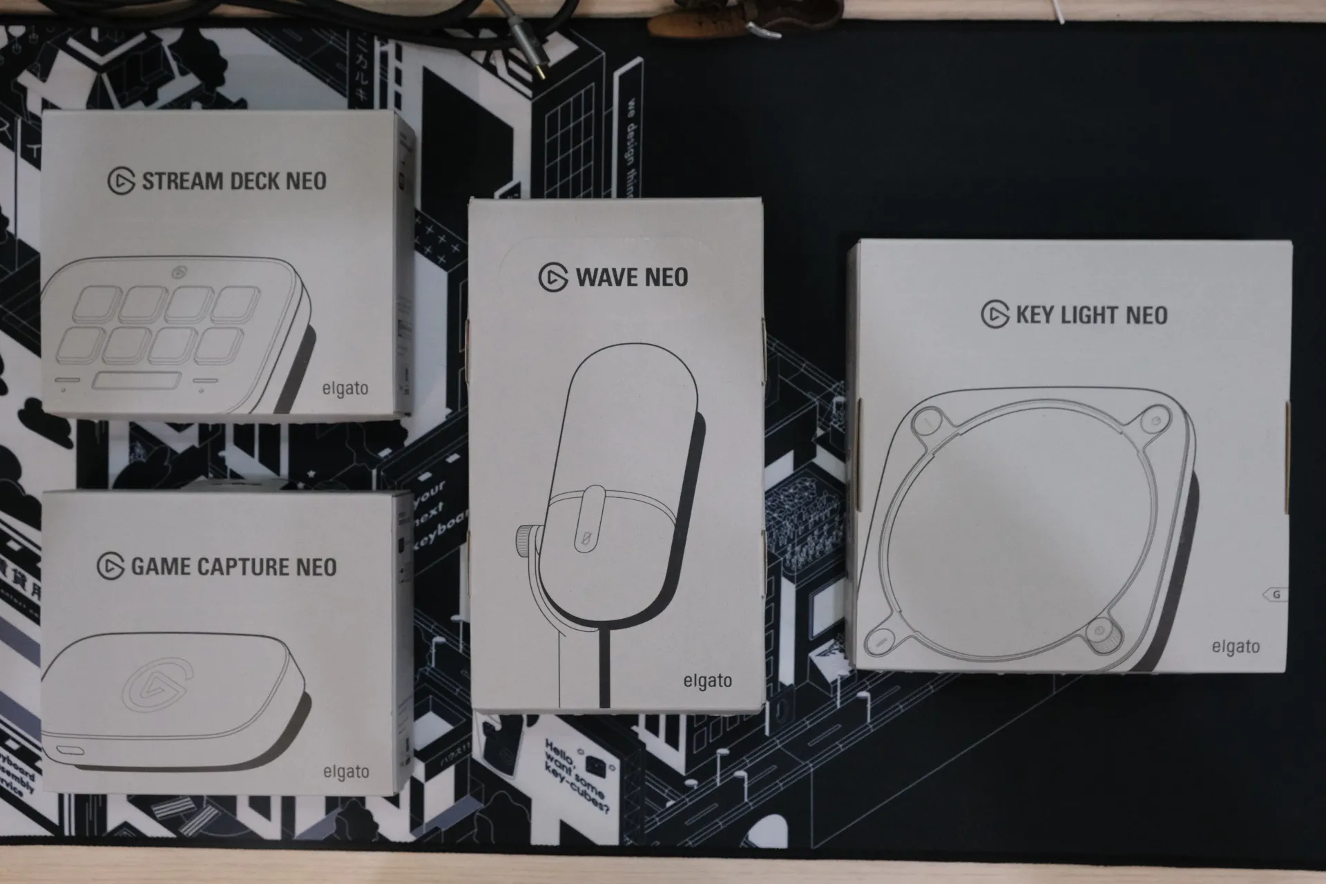 alt text: Elgato Neo product lineup showcasing the white color scheme and packaging