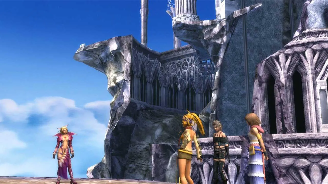 alt text: Final Fantasy X-2 Remaster HD showcasing the new character designs for Yuna, Rikku and Paine.
