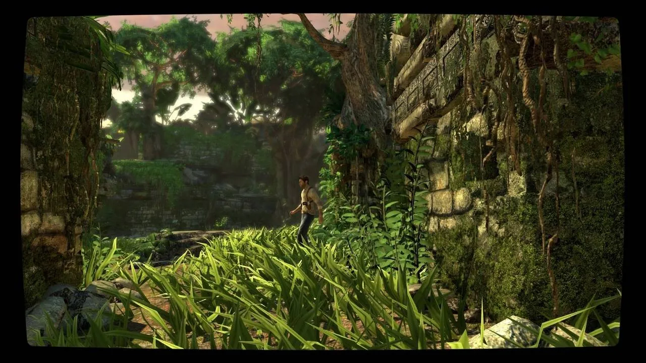 alt text for image 2: Nathan Drake clinging to a cliff face in Uncharted: Drake's Fortune Remastered