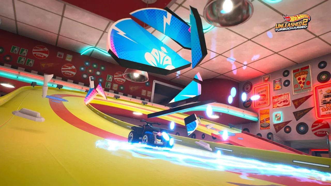 alt text: Gameplay screenshot showing a Hot Wheels car racing through a vibrant track in Hot Wheels Unleashed 2: Turbocharged