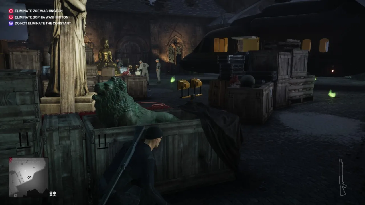alt text: Hitman 2 gameplay screenshot depicting Agent 47 observing a target through a window.