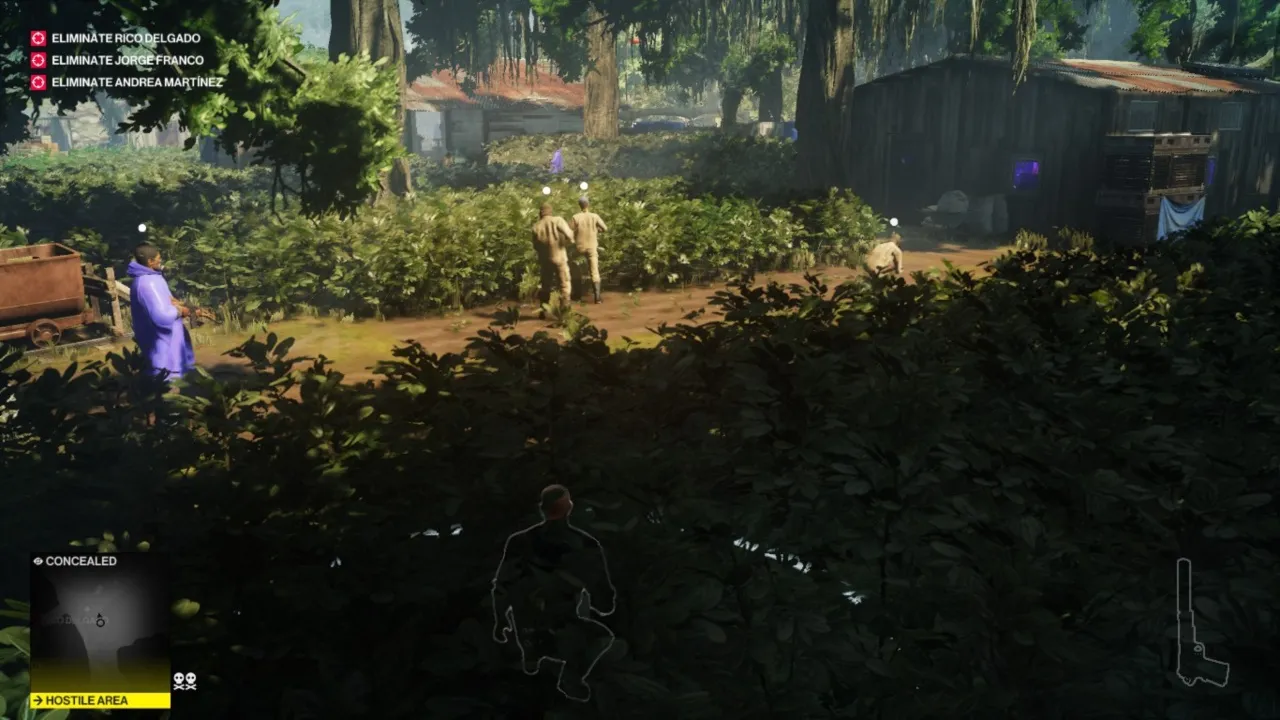 alt text: Hitman 2 gameplay screenshot showing Agent 47 holding a silenced pistol.