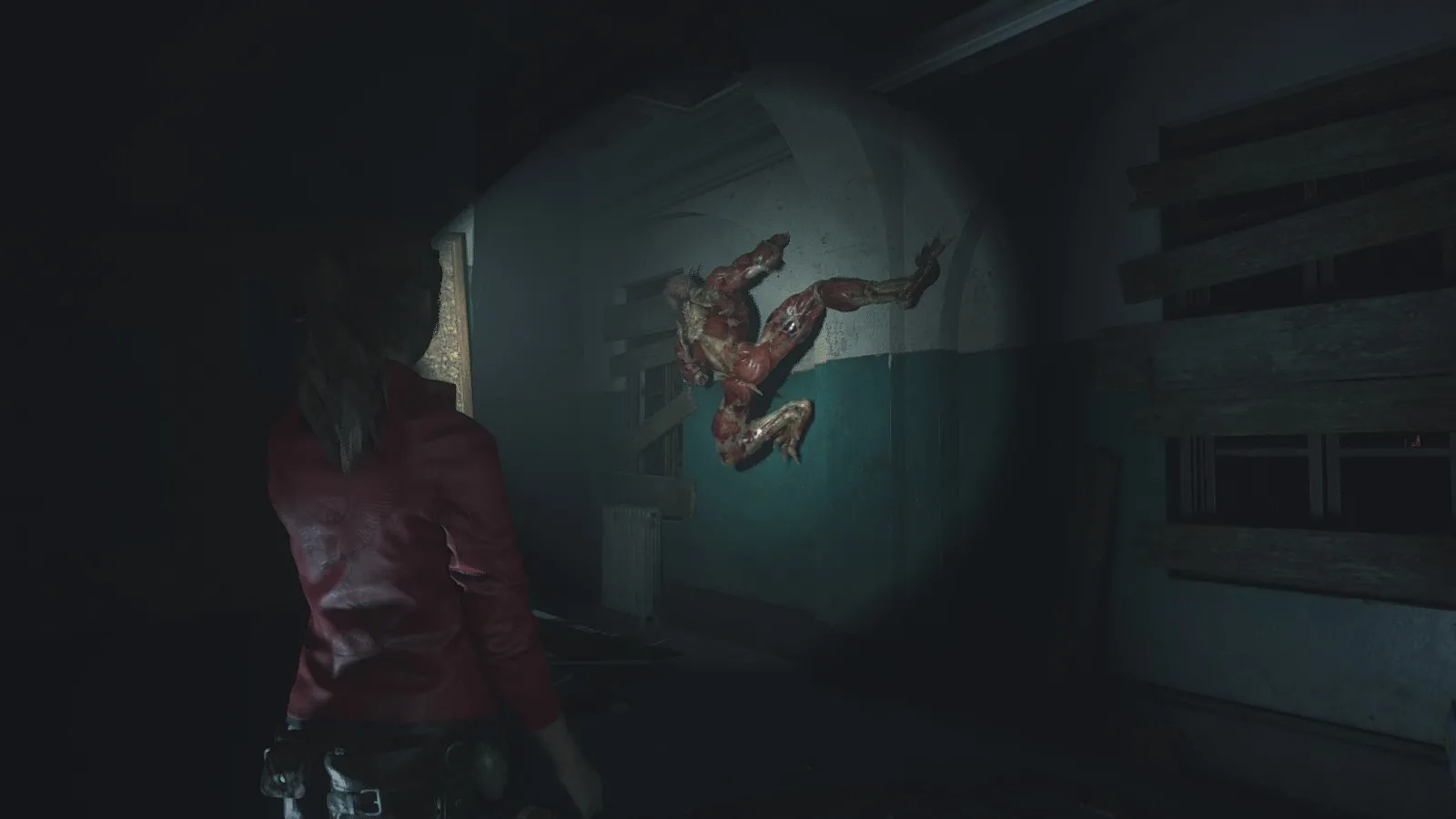 alt text showing a close-up of a zombie in Resident Evil 2 Remake, highlighting the game's realistic graphics and gruesome detail