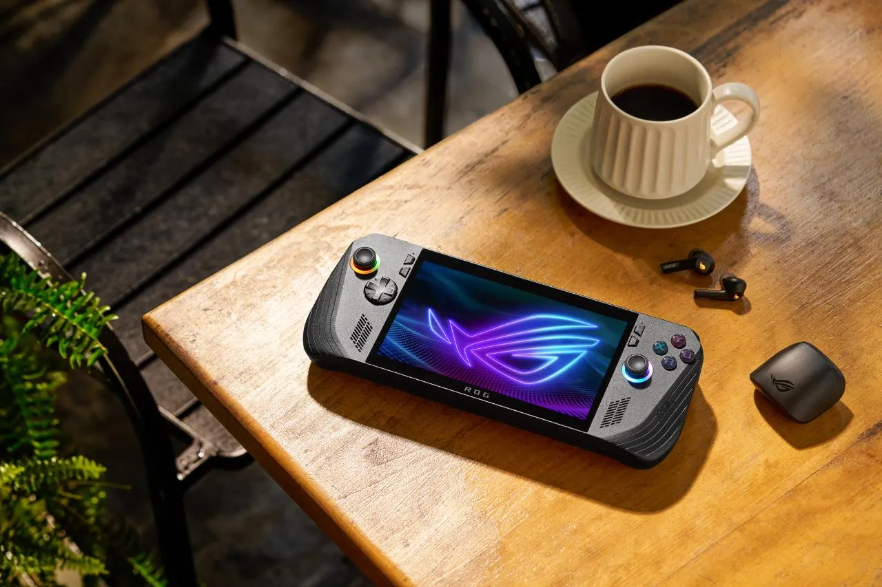 alt text: The ASUS ROG Ally X handheld gaming console being held, showcasing its ergonomic design and comfortable grip
