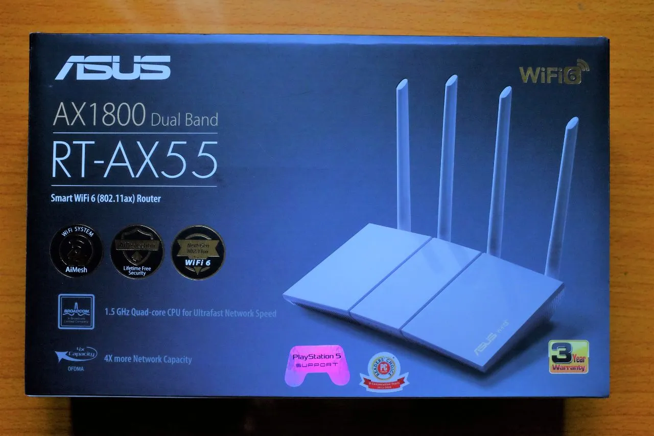 ASUS RT-AX55 packaging showcasing key features like Wi-Fi 6 and AiMesh.