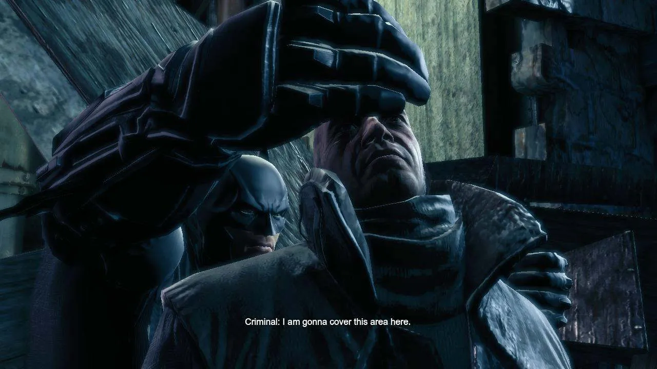 Batman fighting enemies in Arkham Origins