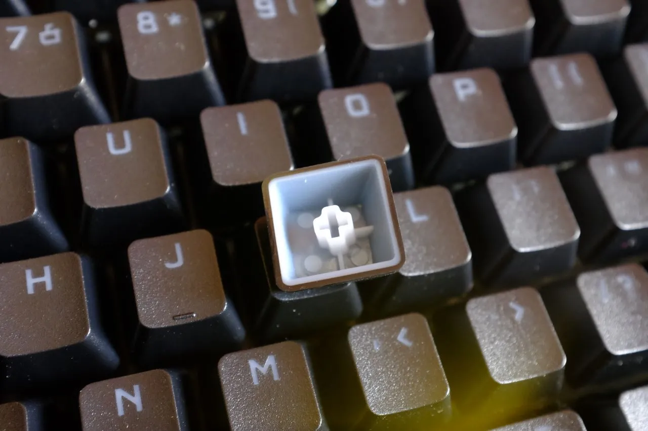 Close-up of the Corsair K70 RGB Pro Speed Switch keycaps and volume roller