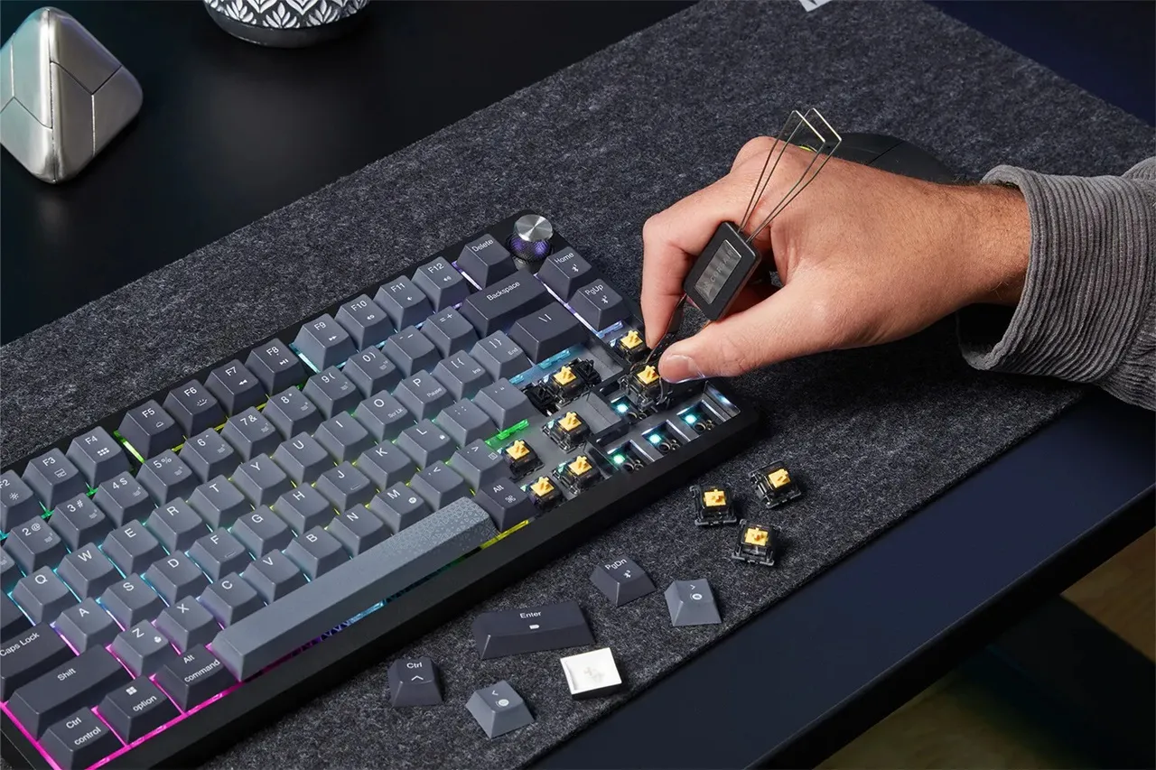 CORSAIR K65 PLUS Wireless keyboard with per-key RGB lighting.