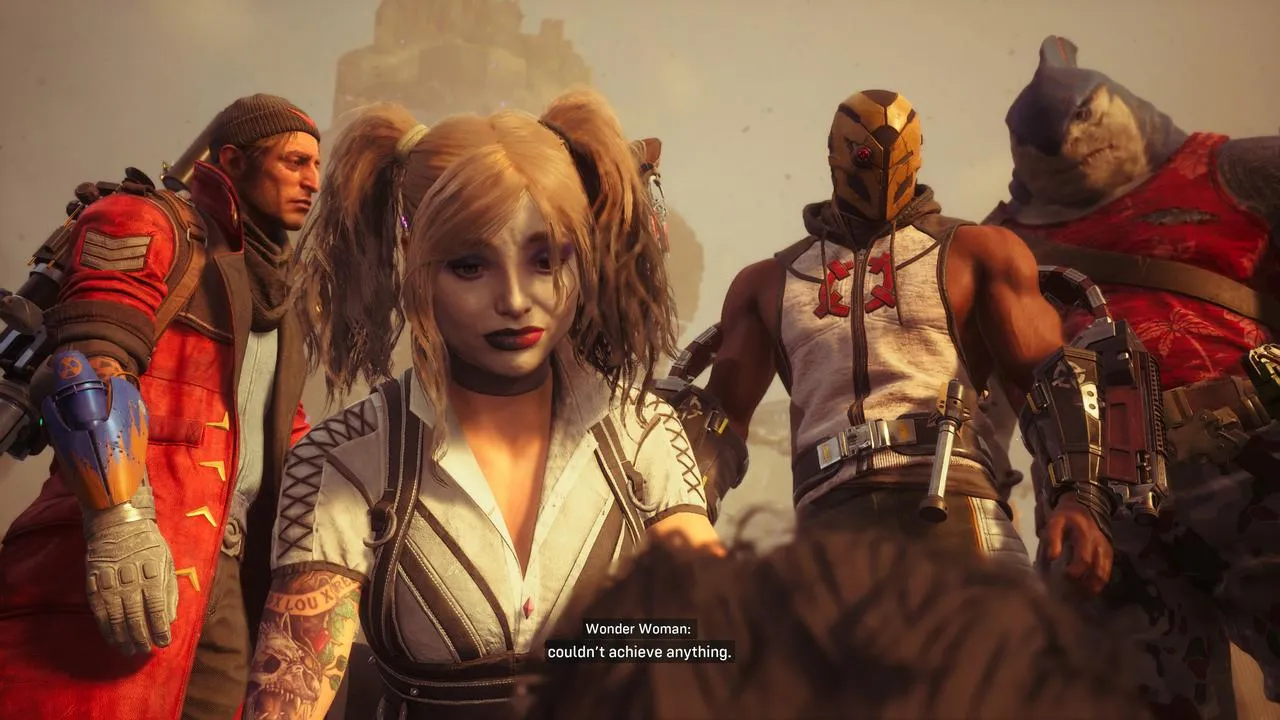 Deadshot, Harley Quinn, King Shark, and Captain Boomerang stand together.