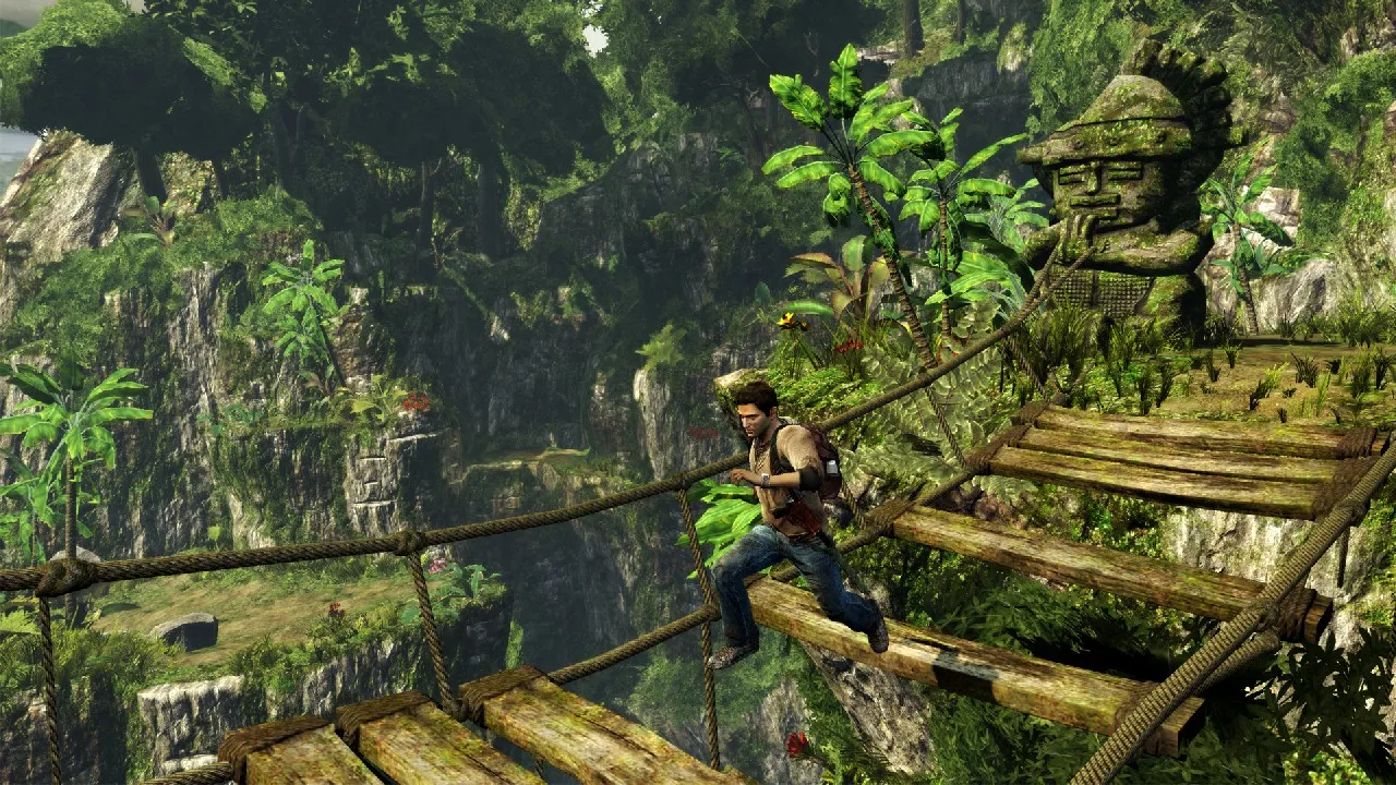 Drake climbing a cliff in Uncharted: Golden Abyss