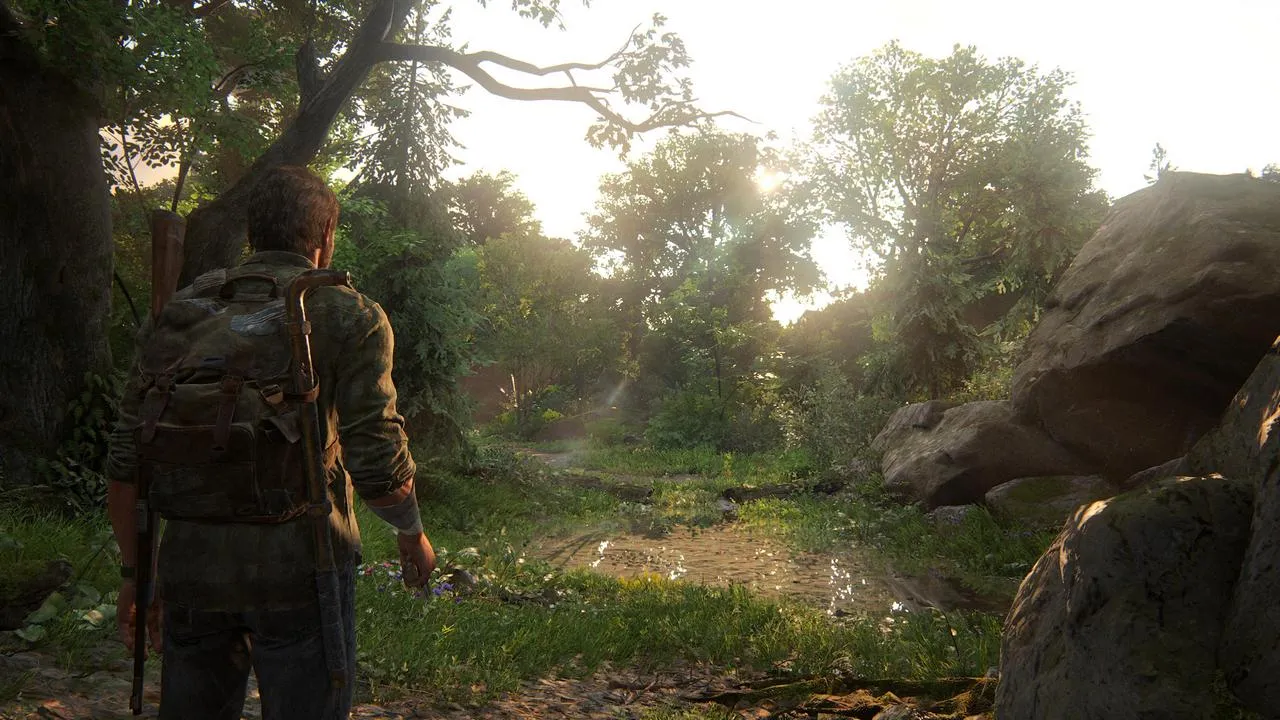 Joel fighting enemies in The Last of Us Part I