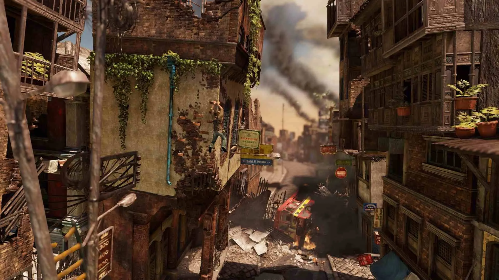 Nathan Drake hanging from a train in Uncharted 2: Among Thieves