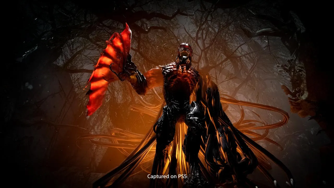 Selene fighting enemies in a dark environment